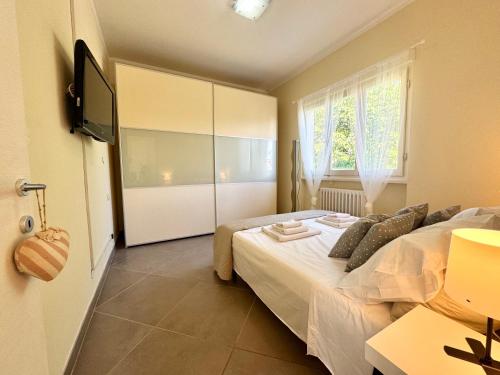 Ένα ή περισσότερα κρεβάτια σε δωμάτιο στο Villa Margherita, a 10 minuti dal Mare