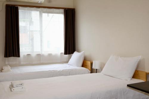 Katil atau katil-katil dalam bilik di 京都東福寺鴨川沿いGuest house Kyoan private room貸切独立卫浴鸭川旁边多人一起入住划算