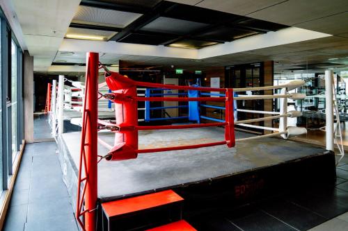 a red and blue boxing ring in a gym at Hotel Indigo Phuket Patong by IHG in Patong Beach