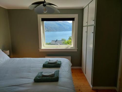 Ένα ή περισσότερα κρεβάτια σε δωμάτιο στο Norwegian Fjords Time Out