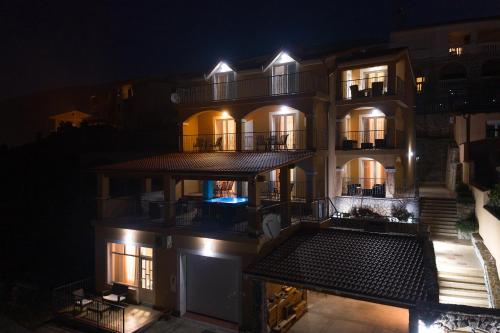 an aerial view of a building at night at Seabreeze Apartments with Shared Jacuzzi in Senj