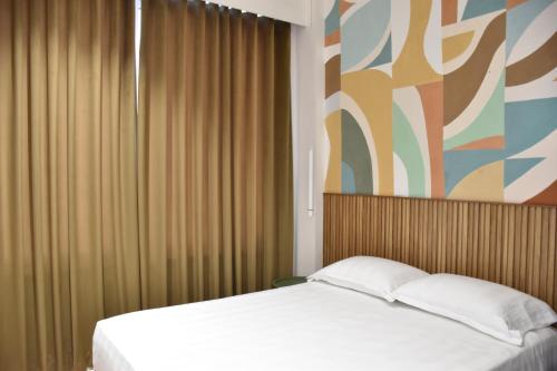 Krevet ili kreveti u jedinici u okviru objekta Wavefront Apartment 1