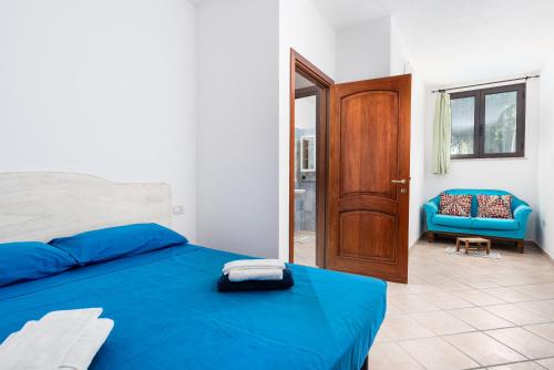 Ein Bett oder Betten in einem Zimmer der Unterkunft Su Nidu Virde - Ginepro