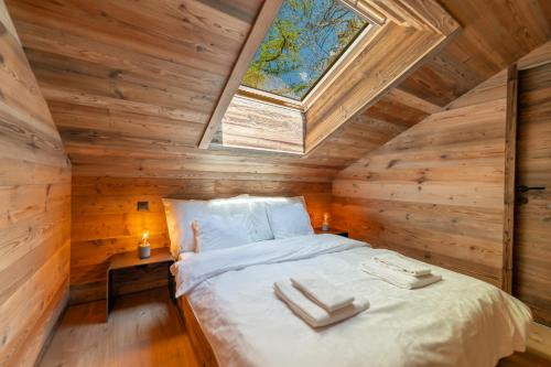 Postel nebo postele na pokoji v ubytování Chalet Plalessu - Latitude Champéry