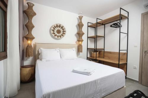 Postel nebo postele na pokoji v ubytování Petra Luxury Suites