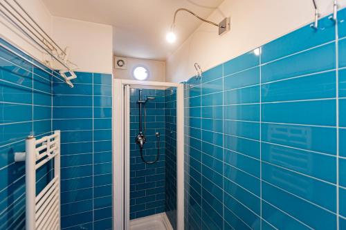 Ένα μπάνιο στο INGEGNOLI1 Bright top floor apartment