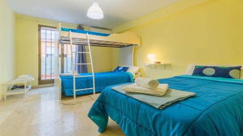 Posteľ alebo postele v izbe v ubytovaní Apartamento Pergo Centro Córdoba
