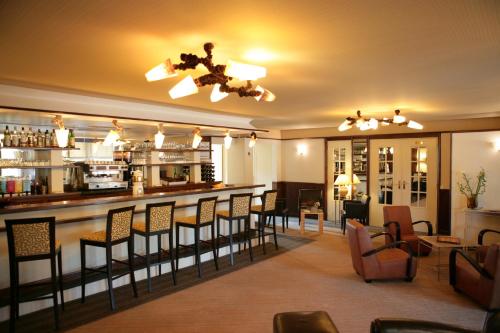 The lounge or bar area at Le Faisan Dore