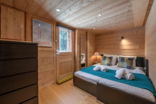Ένα ή περισσότερα κρεβάτια σε δωμάτιο στο Chalet face Aiguille Verte