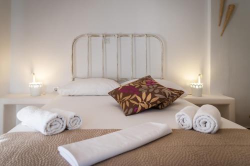 Postel nebo postele na pokoji v ubytování Oceanis Rooms