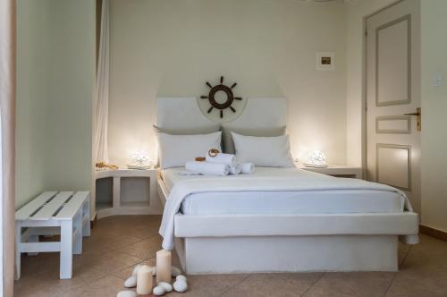 Voodi või voodid majutusasutuse Oceanis Rooms toas