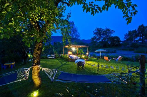 a horse grazing in a yard at night at Haidi House in Agerola