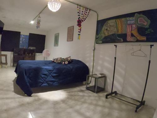 Letto o letti in una camera di Depto CENTRO Parque Juarez