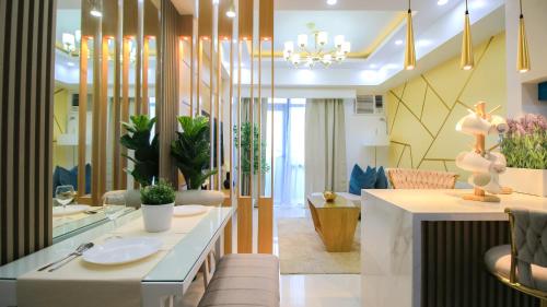 a bathroom with a sink and some plants at Cozy & Modern 2BR Unit in Manhattan Cubao with Balcony in Sampong