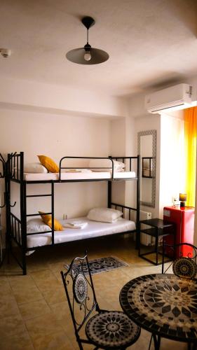 Ένα ή περισσότερα κρεβάτια σε δωμάτιο στο Taxi Hostel