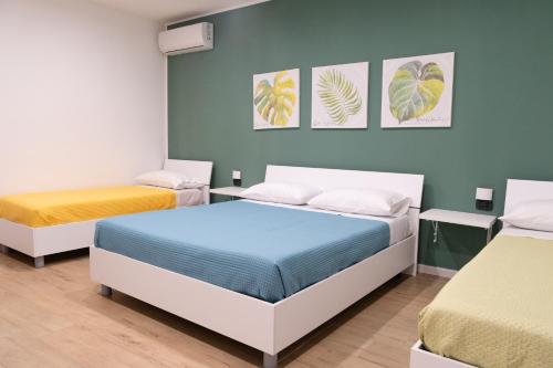 Ένα ή περισσότερα κρεβάτια σε δωμάτιο στο B&B L'Oblo'