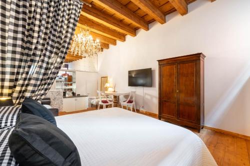 Postel nebo postele na pokoji v ubytování Garçonnière