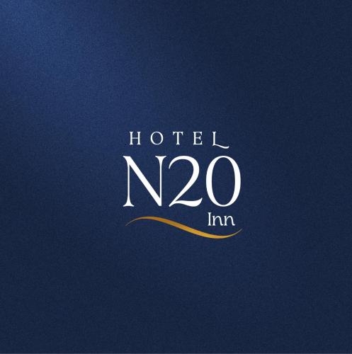 a sign that reads hotel in white on a blue background at N20 Inn Hotel in Mallow