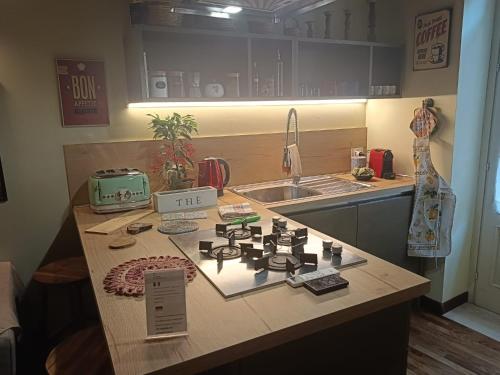 Кухня или мини-кухня в We # Are ai Cassarelli
