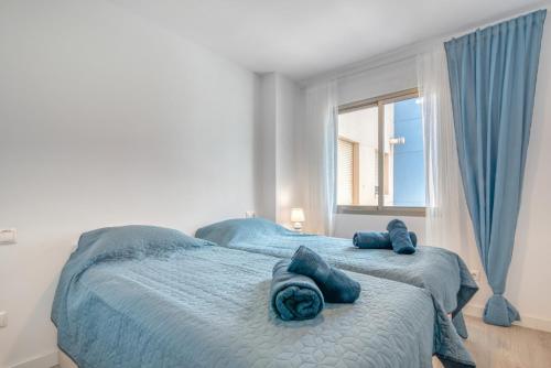 Postel nebo postele na pokoji v ubytování Apartamento Familiar en Calpe