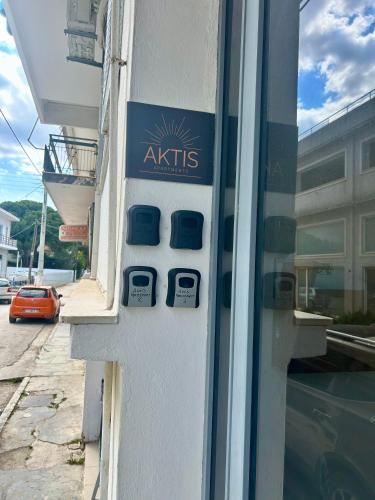 a akris sign on the side of a building at AKTIS apartment 4 near airport in Artemida