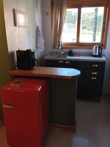 Kuchyň nebo kuchyňský kout v ubytování Folk Cabin