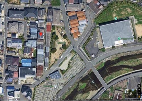 a map of a city with buildings and a street at AnNam Stay NEW HOTARUGAIKE in Toyonaka