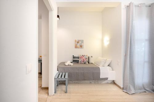 Una cama o camas en una habitación de Fiorado