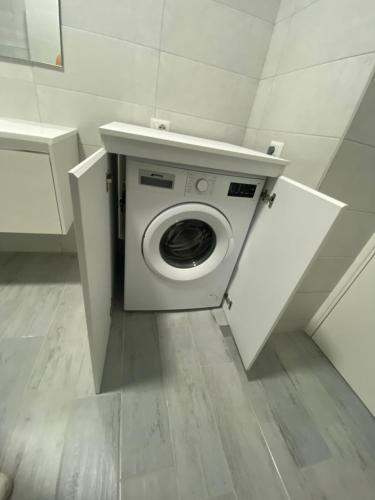 a washing machine in a bathroom with a counter at Annarè Home in Vasto
