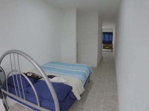 a hospital room with a bed and a hallway at Depto Zona UV Lagos Isleta 103 in Xalapa