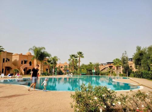Bazén v ubytování Appartement résidence Atlas Golf Resort Palmeraie nebo v jeho okolí