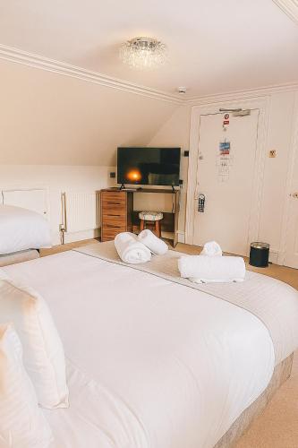 Ένα ή περισσότερα κρεβάτια σε δωμάτιο στο Netherley Rooms