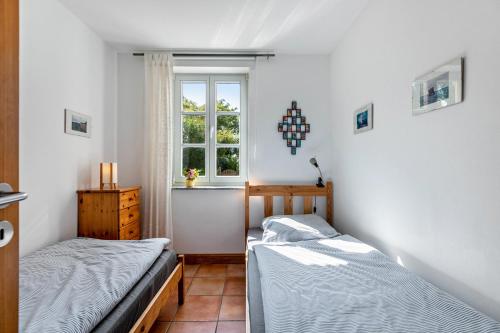 Postel nebo postele na pokoji v ubytování Friesenhaus an der Schlei