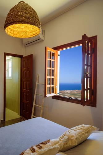 Katil atau katil-katil dalam bilik di Terra Blanca Suites