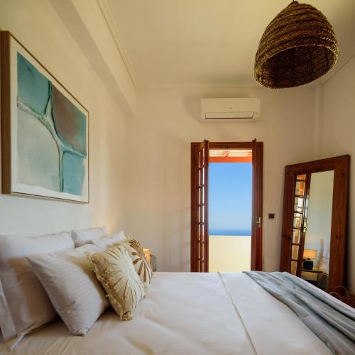 Katil atau katil-katil dalam bilik di Terra Blanca Suites