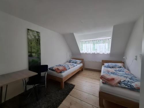 Ένα ή περισσότερα κρεβάτια σε δωμάτιο στο Ferienhaus Spes