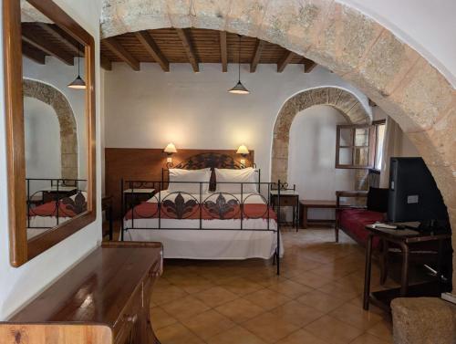 Ένα ή περισσότερα κρεβάτια σε δωμάτιο στο Antifanous Apartments