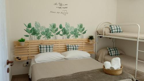 A bed or beds in a room at L'antico borgo