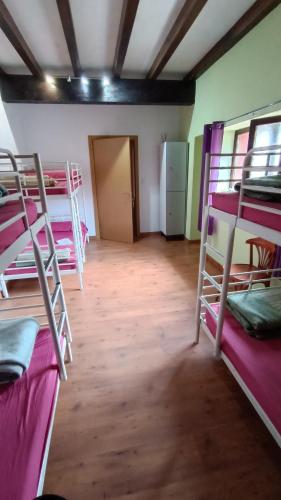 Katil atau katil-katil dalam bilik di Albergue El Caserón de Vidiago