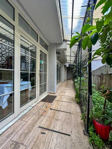 an empty hallway of a house with plants at Sarnic Premier Hotel in Istanbul