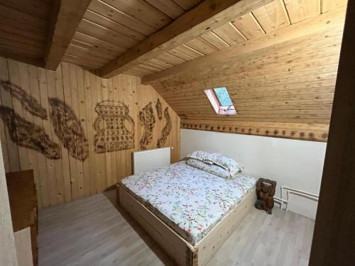 Postel nebo postele na pokoji v ubytování Casa Bujanovski