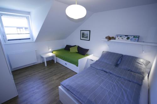 Postel nebo postele na pokoji v ubytování Haus Karla