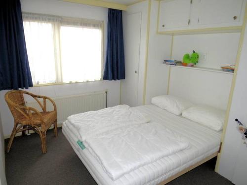 Postel nebo postele na pokoji v ubytování Parel in Makkum