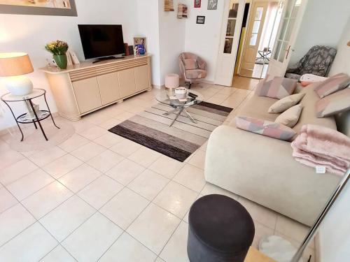 Appartement T3 avec Terrasse et Garage - À 600m des Plages et Commerces, Résidence Sécurisée - FR-1-316-205