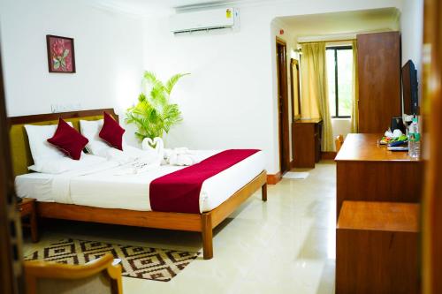 Postel nebo postele na pokoji v ubytování Hotel Golden Anchor ,Paradeep