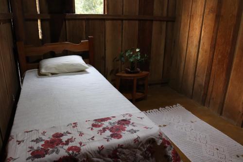 Postel nebo postele na pokoji v ubytování Chacara Refugio das Babaçus