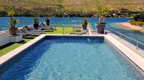 Πισίνα στο ή κοντά στο Apartments Holidays Roko
