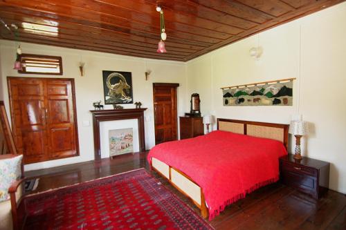 Katil atau katil-katil dalam bilik di Deodar Manor