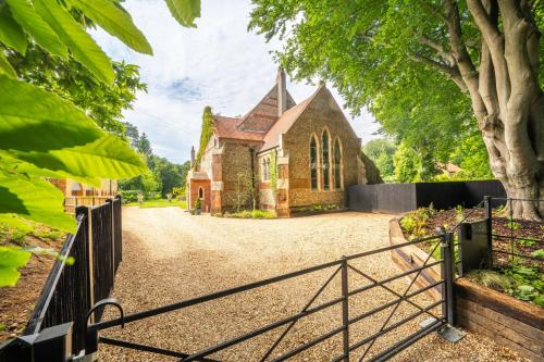 an entrance to an old church with a gate at The Chapel in North Elmham