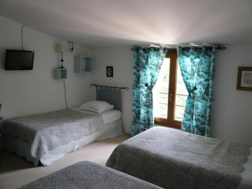 Ένα ή περισσότερα κρεβάτια σε δωμάτιο στο Hotel Mistral